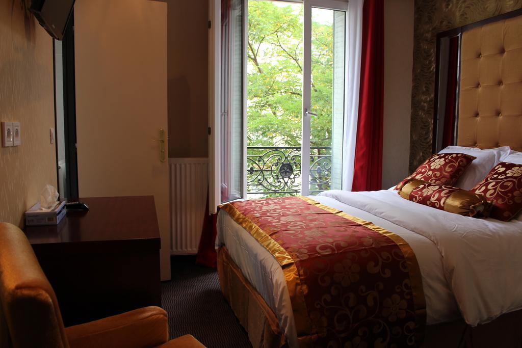 Hotel Des Buttes Chaumont Париж Стая снимка